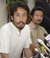 2 freed Japanese apologize for causing trouble